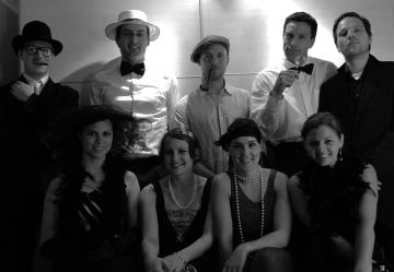 Charmante Abendgesellschaft bei der Theaterpremiere: Franz T., Emil, Tomas M., Inspektor Fischer, Josef T., Babitschka, Magdalena, Viola, Helena